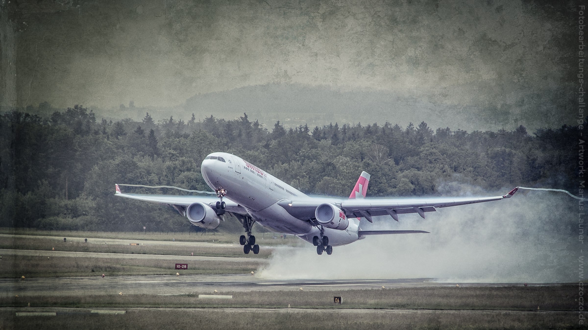 2012-06-03-LSZH-0415-Flugzeug im Regen